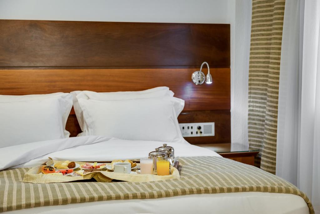 Postel nebo postele na pokoji v ubytování Kuster Hotel