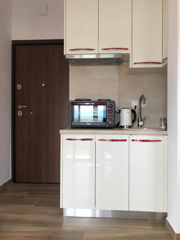 Kuchyňa alebo kuchynka v ubytovaní dream penthouse