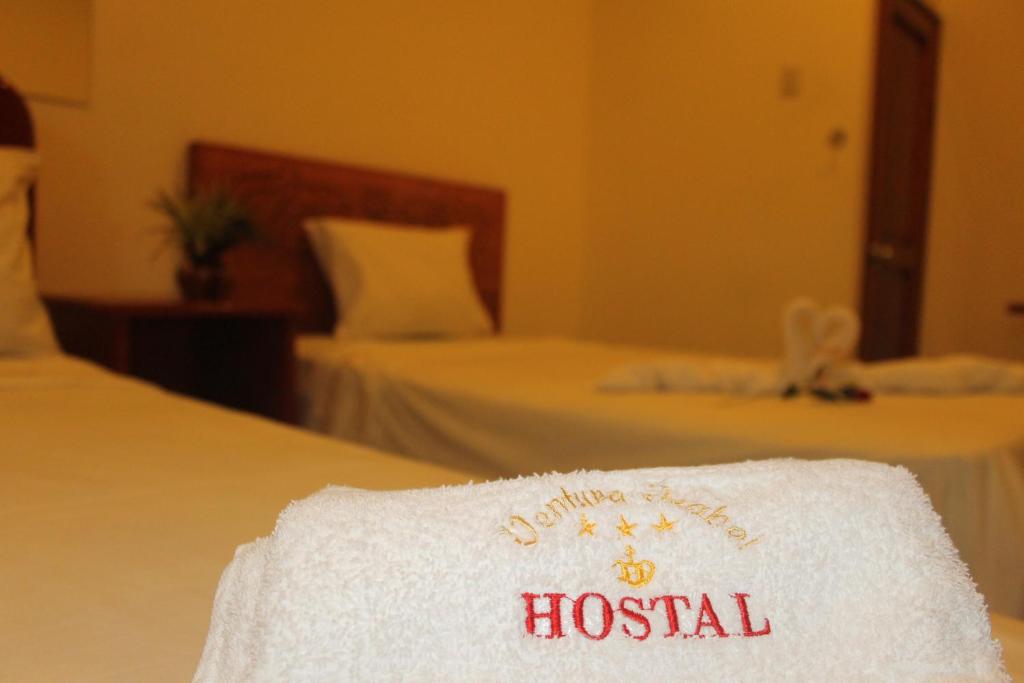 Una cama o camas en una habitación de Hostal Ventura Isabel