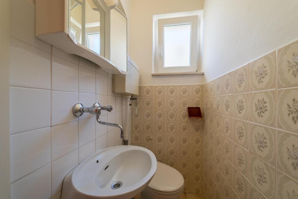 Koupelna v ubytování Apartments Jakovčev