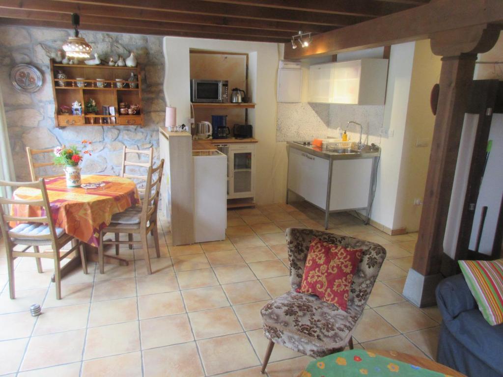 Kuchyň nebo kuchyňský kout v ubytování La Muria Apartment