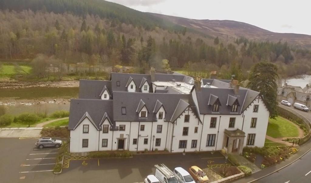 an aerial view of a large white building at Montclaire in Ballater