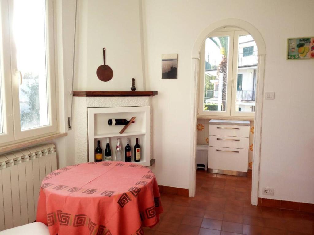 a room with a table with wine bottles on it at Etrusco Antico in Capodimonte