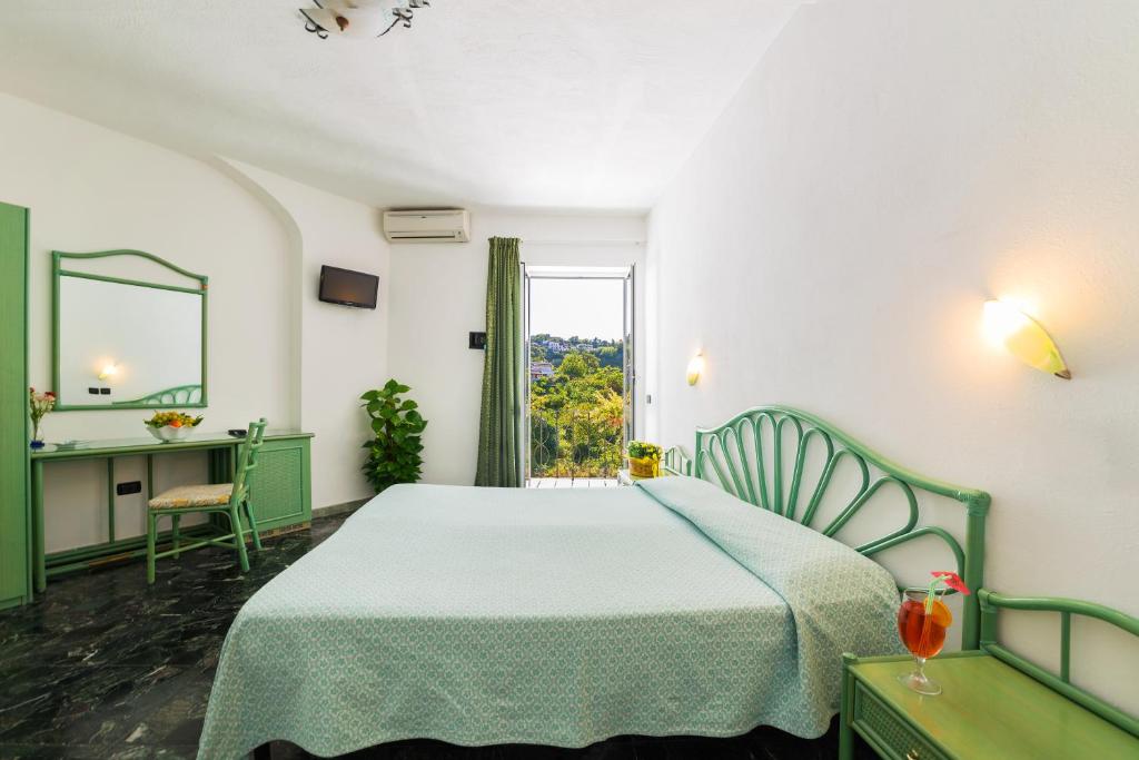 Postel nebo postele na pokoji v ubytování B&B Verde