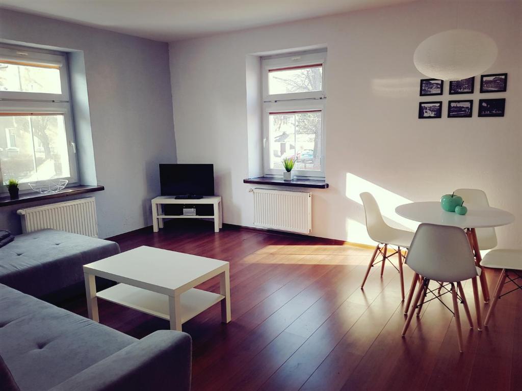 Posedenie v ubytovaní Apartament Szczawno-Zdrój