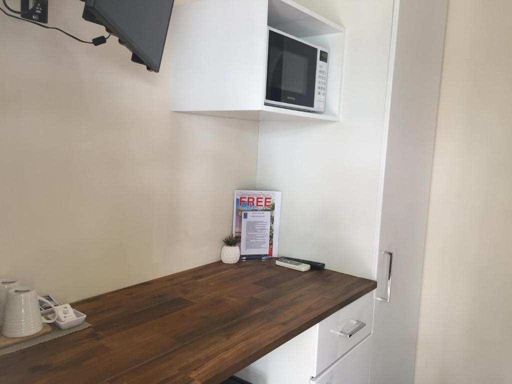 Kuchyň nebo kuchyňský kout v ubytování Narimba Motel