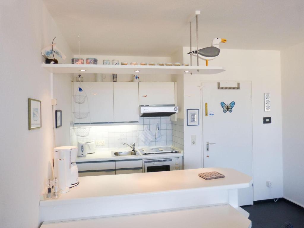Kuchyň nebo kuchyňský kout v ubytování Ferienwohnung *Mein Meerblick*