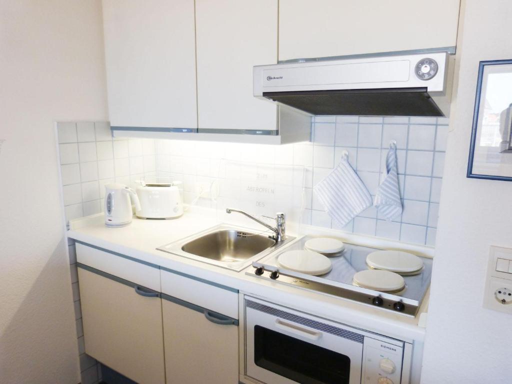 Kuchyň nebo kuchyňský kout v ubytování Ferienwohnung *Mein Meerblick*