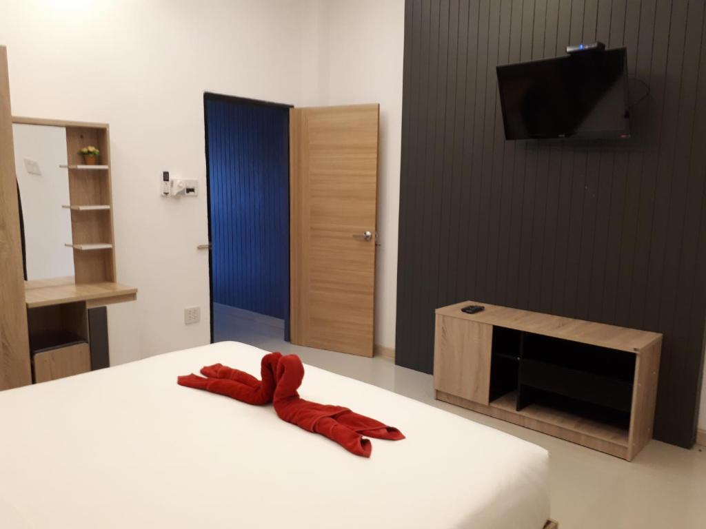 Postel nebo postele na pokoji v ubytování Blue Moon Design House