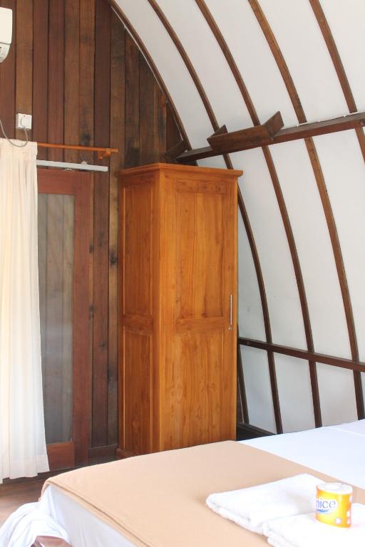 Postel nebo postele na pokoji v ubytování Melati Cottage