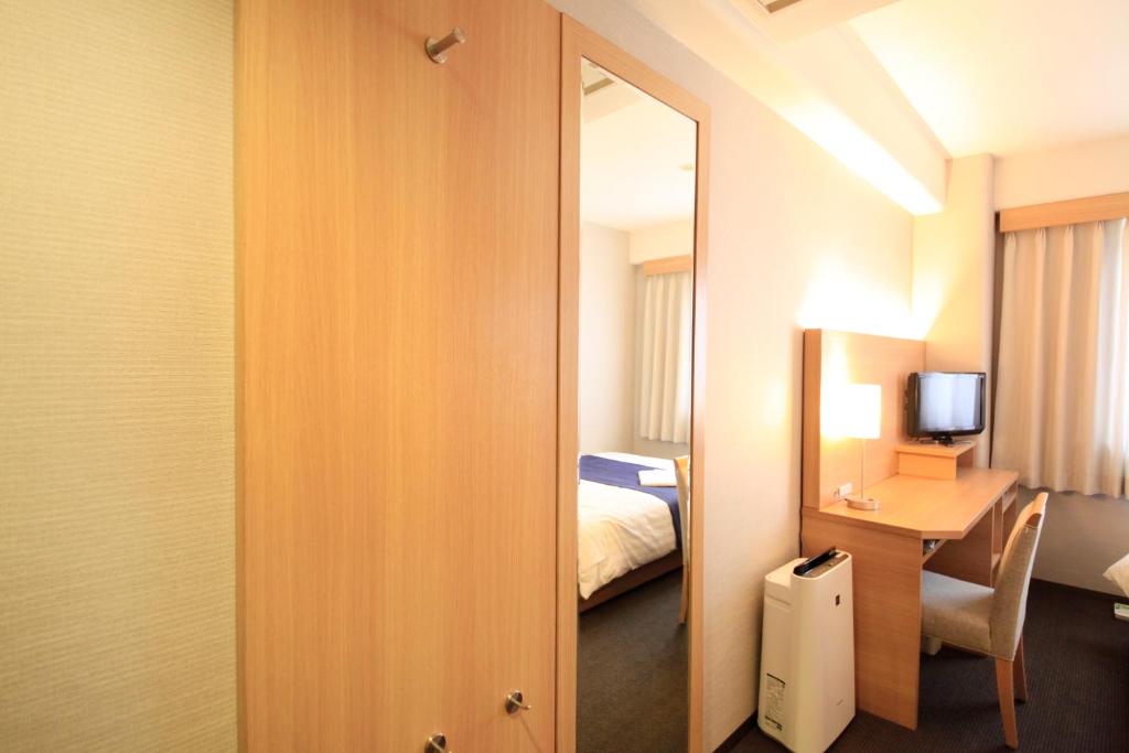 TV a/nebo společenská místnost v ubytování Shonandai Daiichi Hotel Fujisawa Yokohama