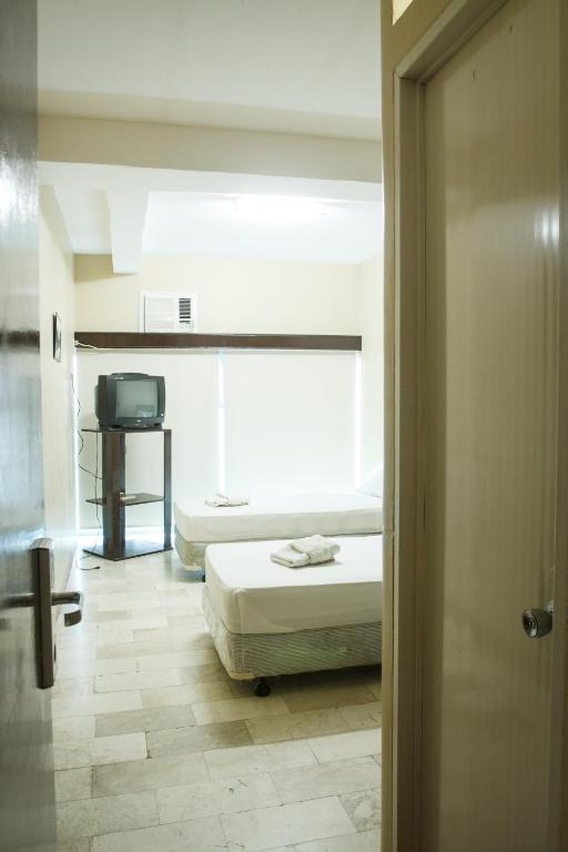 Postel nebo postele na pokoji v ubytování GV Hotel - Valencia