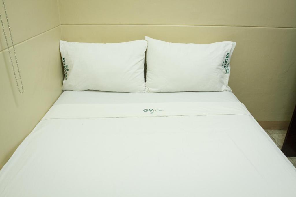 Postel nebo postele na pokoji v ubytování GV Hotel - Valencia