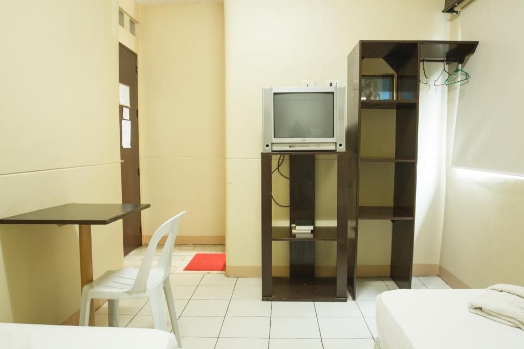 TV a/nebo společenská místnost v ubytování GV Hotel - Valencia