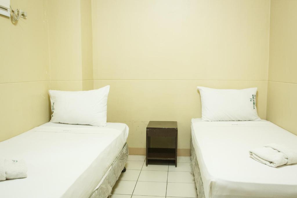 Postel nebo postele na pokoji v ubytování GV Hotel - Valencia