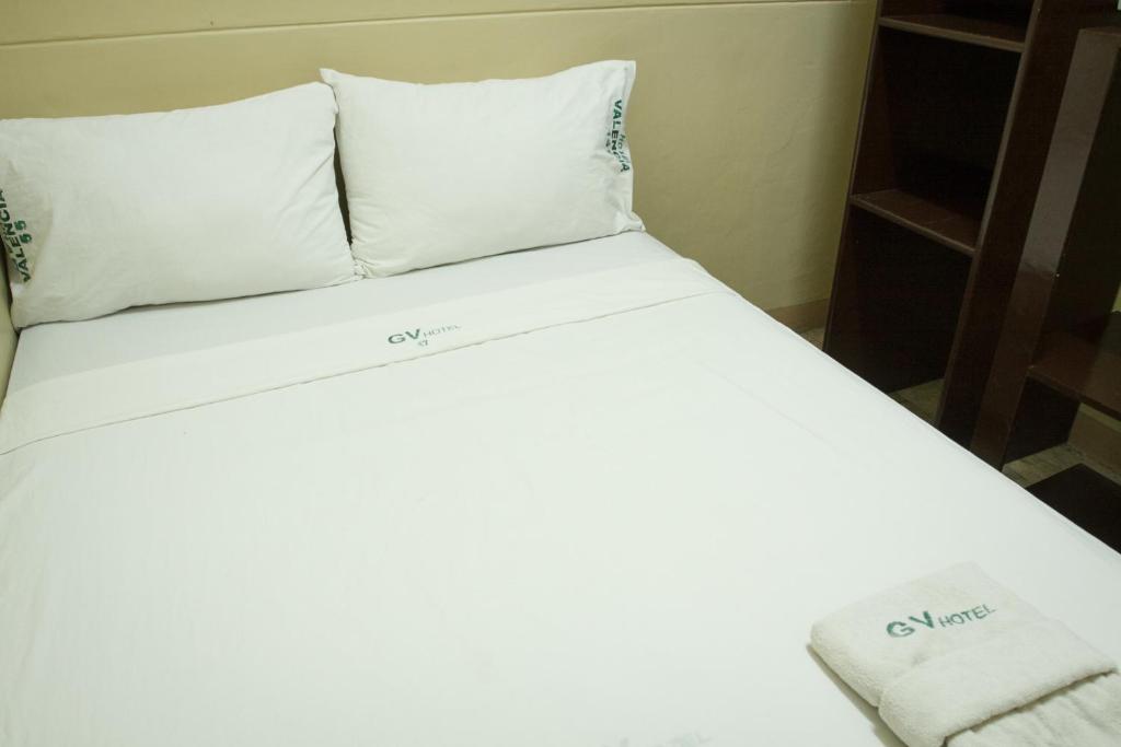 Postel nebo postele na pokoji v ubytování GV Hotel - Valencia