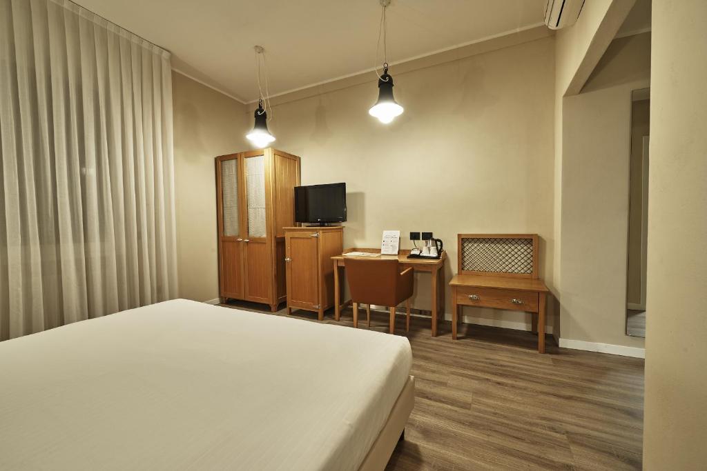 TV a/nebo společenská místnost v ubytování Hotel Miramonti