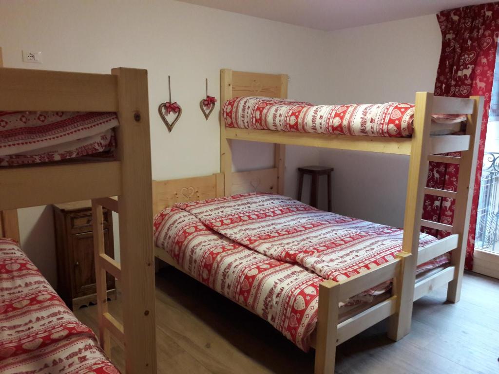 A bed or beds in a room at Olimpic Hostel