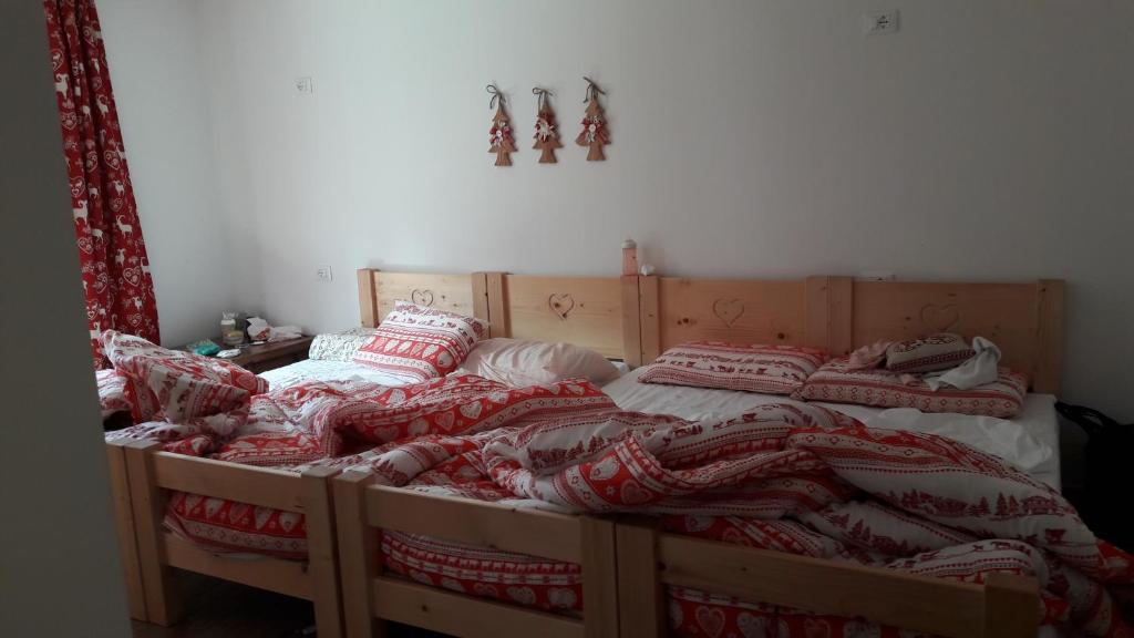 A bed or beds in a room at Olimpic Hostel