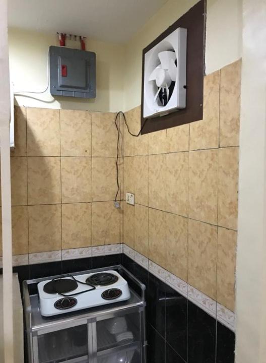 Kuchyň nebo kuchyňský kout v ubytování RV3 TRANSIENT HOUSE