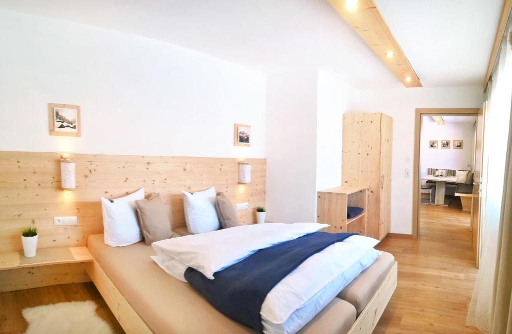 Postel nebo postele na pokoji v ubytování Wiesennest