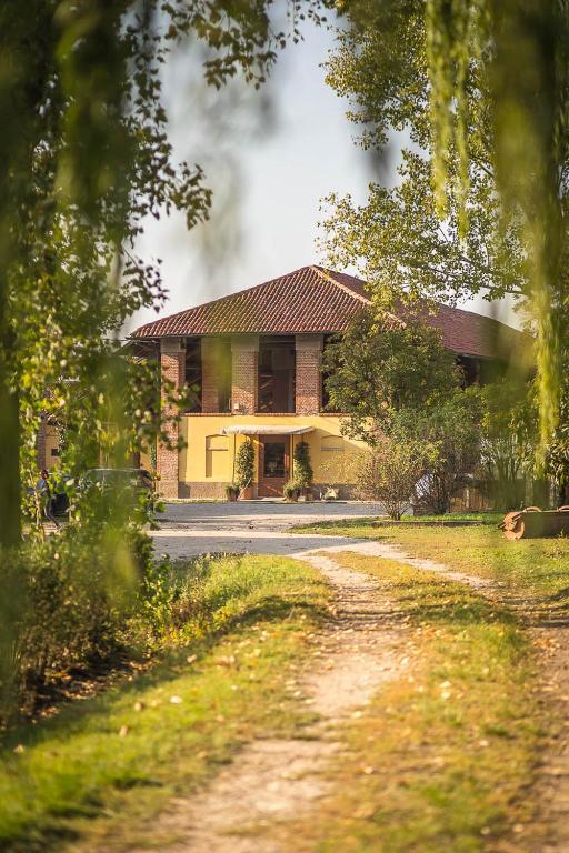 a house with a road in front of it at Cascina Gaggioli in Milan