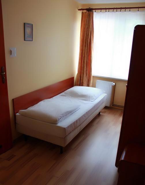Postel nebo postele na pokoji v ubytování City Hostel