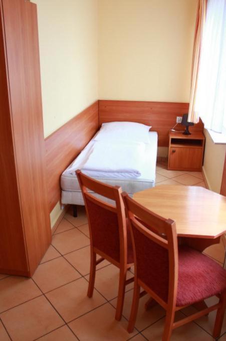 Postel nebo postele na pokoji v ubytování City Hostel