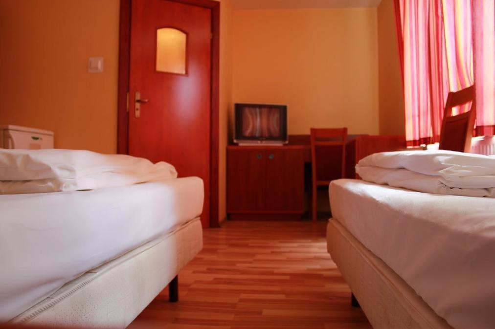 Postel nebo postele na pokoji v ubytování City Hostel