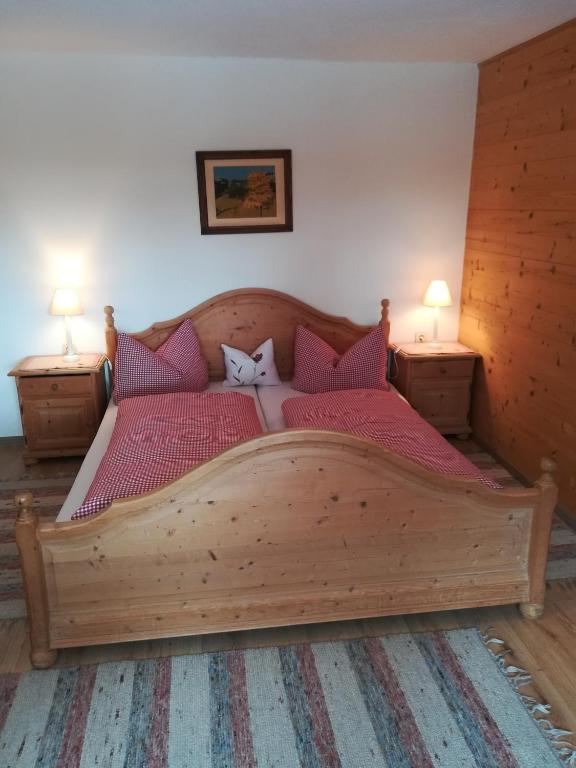 Postel nebo postele na pokoji v ubytování Waldrast
