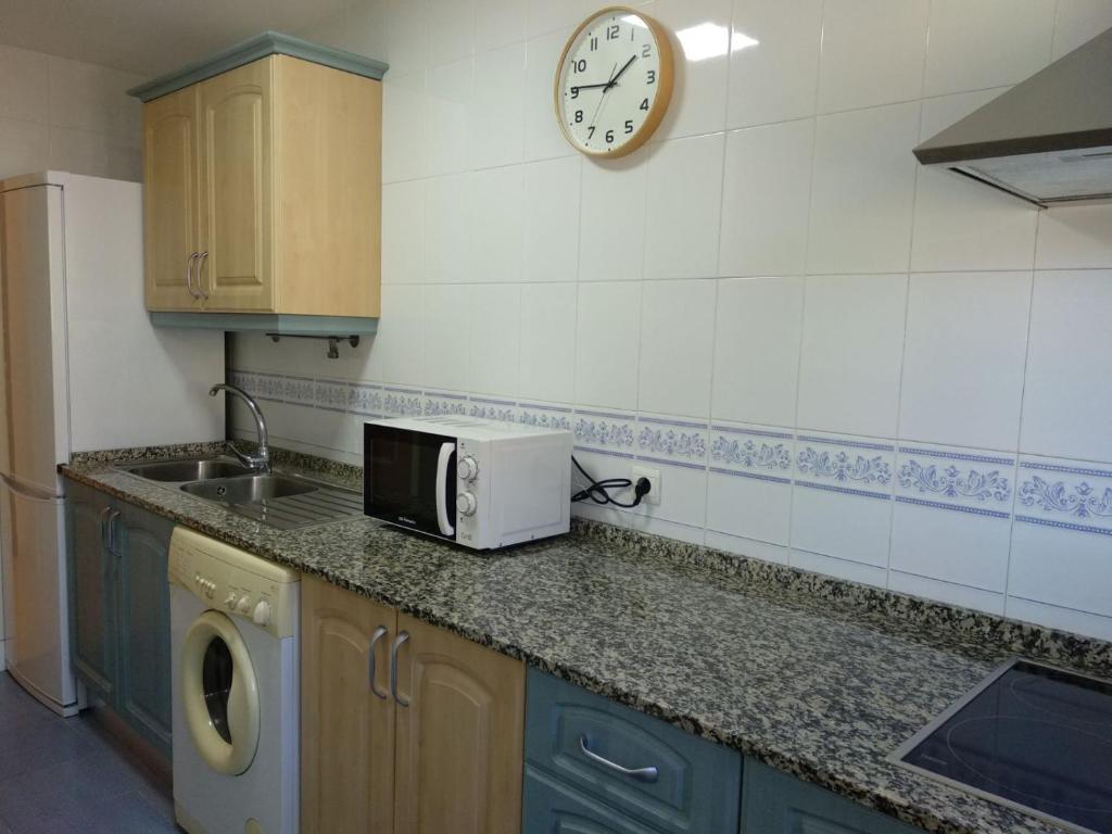 Kuchyň nebo kuchyňský kout v ubytování Apartamento Estrella