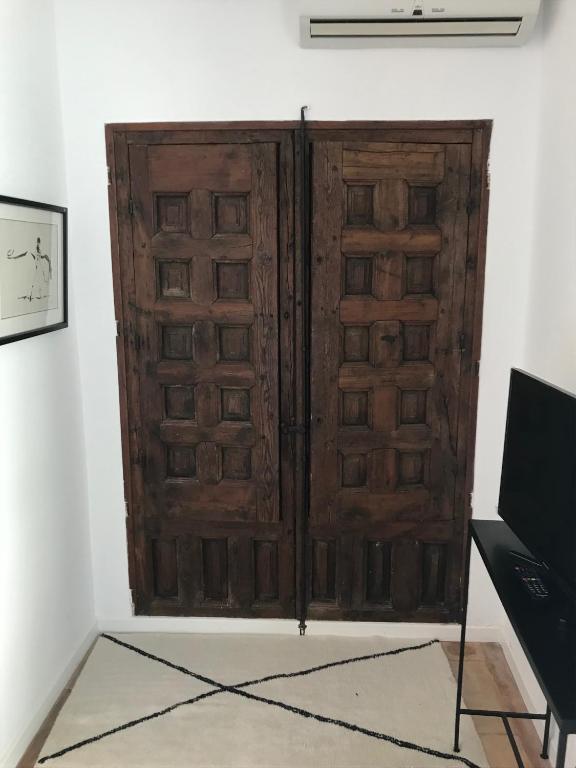 TV a/nebo společenská místnost v ubytování Maison l'Etrier