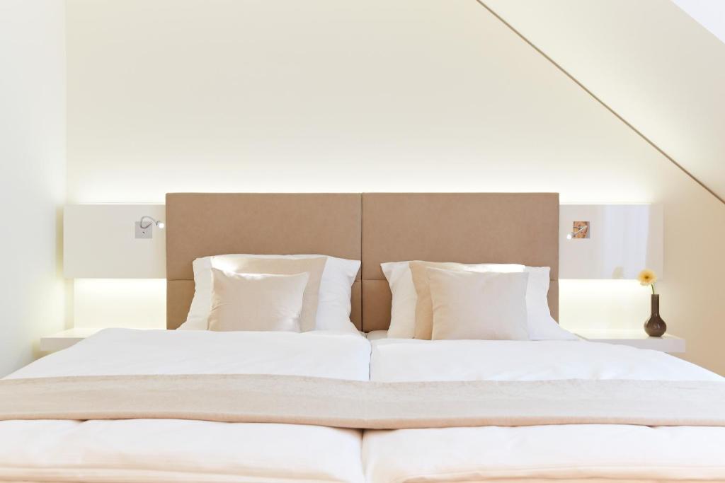 Postel nebo postele na pokoji v ubytování Landhotel Sonne