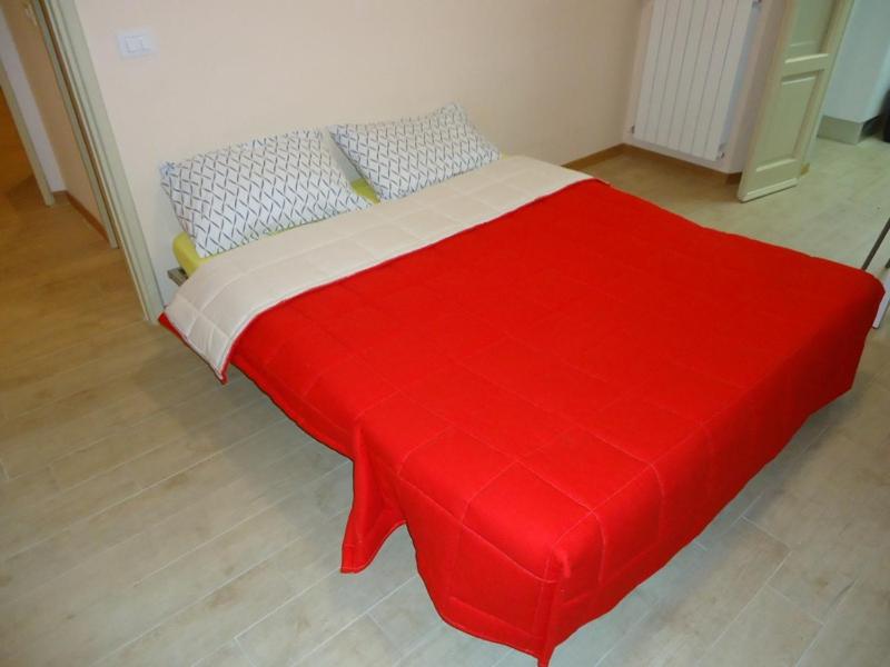 Posteľ alebo postele v izbe v ubytovaní Appartamento con terrazza
