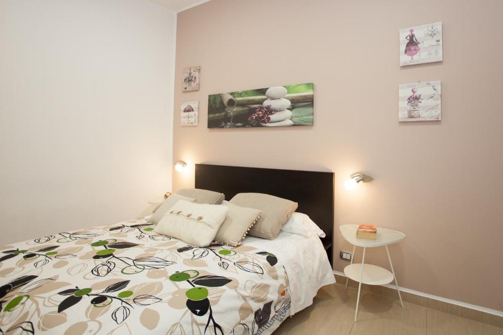 Postel nebo postele na pokoji v ubytování B&B Trio D'Archi - La Pilozza Infiorata