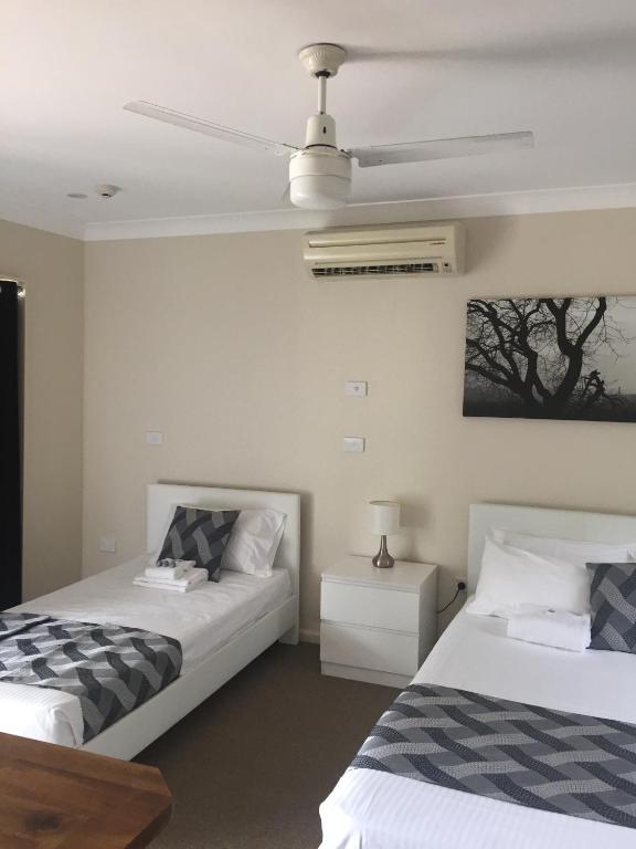 Postel nebo postele na pokoji v ubytování Narimba Motel
