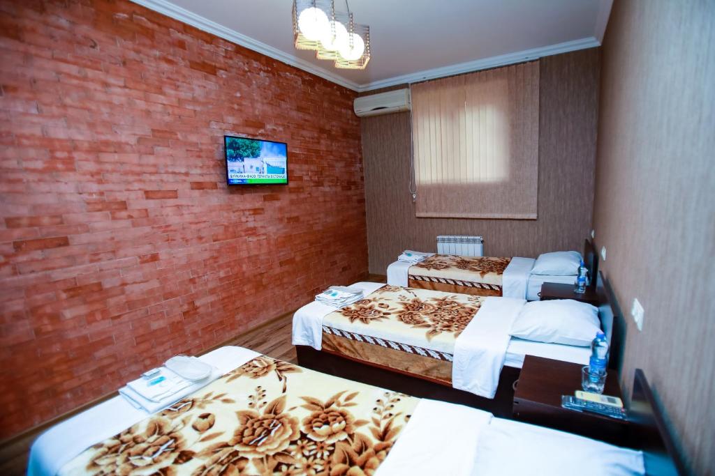 Postel nebo postele na pokoji v ubytování Hotel 4You