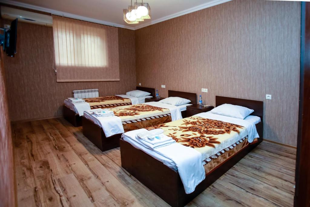 Postel nebo postele na pokoji v ubytování Hotel 4You