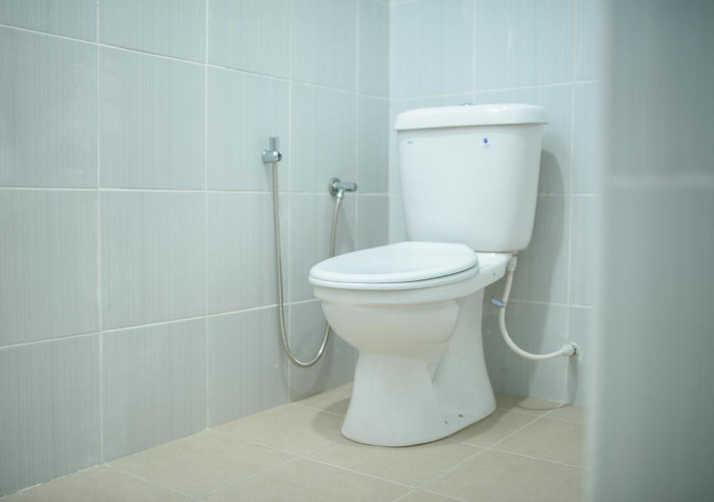 Koupelna v ubytování MG Hotel