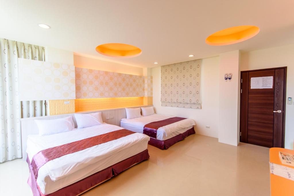 Voodi või voodid majutusasutuse Tiramisu places Sea view Homestay toas