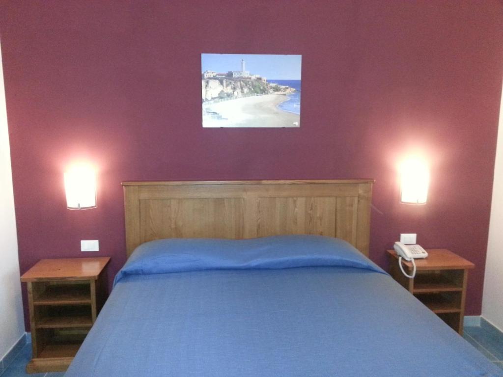 Postel nebo postele na pokoji v ubytování Serpa Hotel