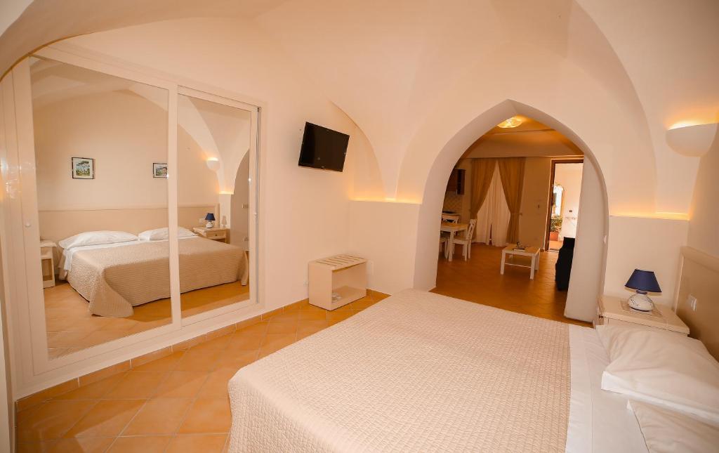 Postel nebo postele na pokoji v ubytování Casa Vacanze Vittoria