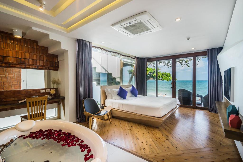 Postel nebo postele na pokoji v ubytování White Sand Samui Resort