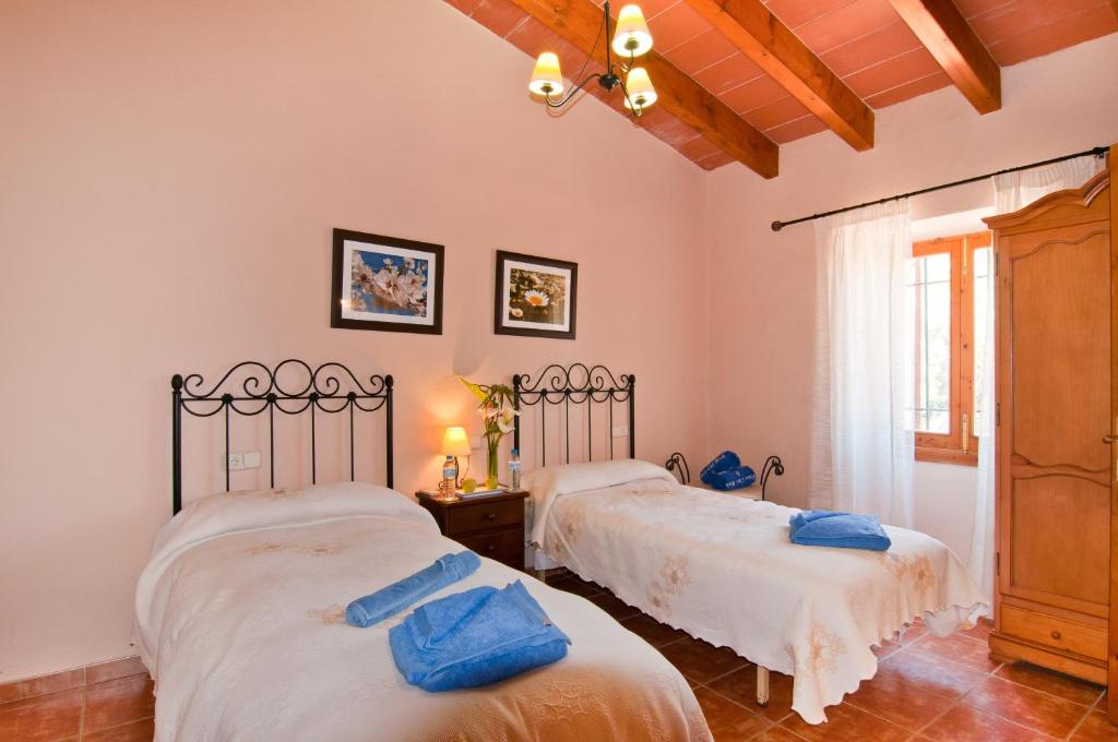 Postel nebo postele na pokoji v ubytování Finca Can Xet