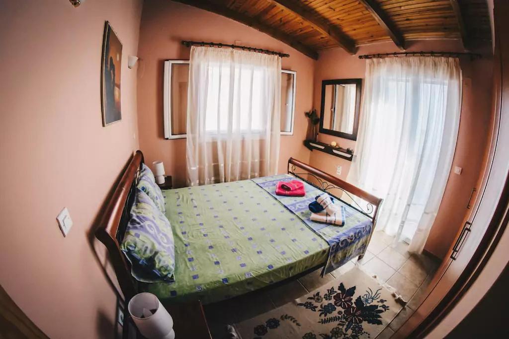 Posteľ alebo postele v izbe v ubytovaní Villa Galanis by the sea