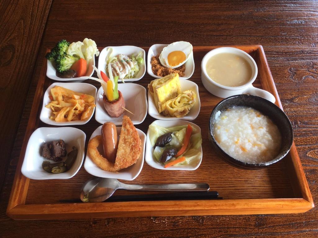 a tray of food with different types of food at Tudor Dynasty Homestay in Yanliau