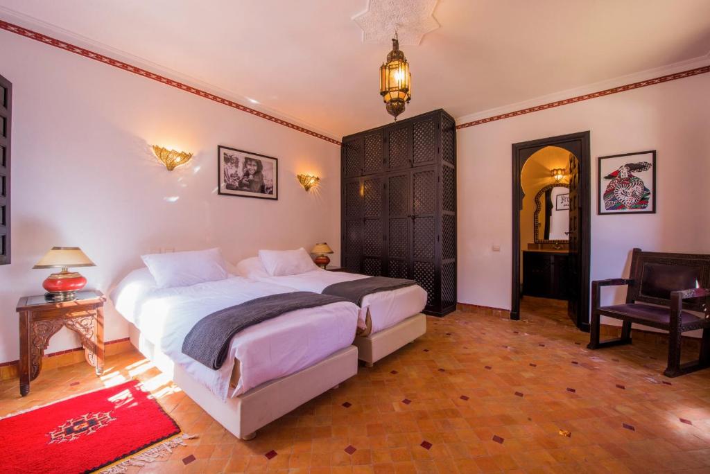 Postel nebo postele na pokoji v ubytování Maison Ayda