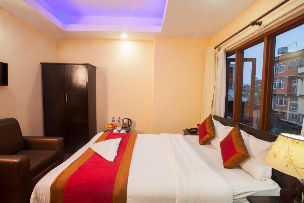 Postel nebo postele na pokoji v ubytování Hotel Dream City