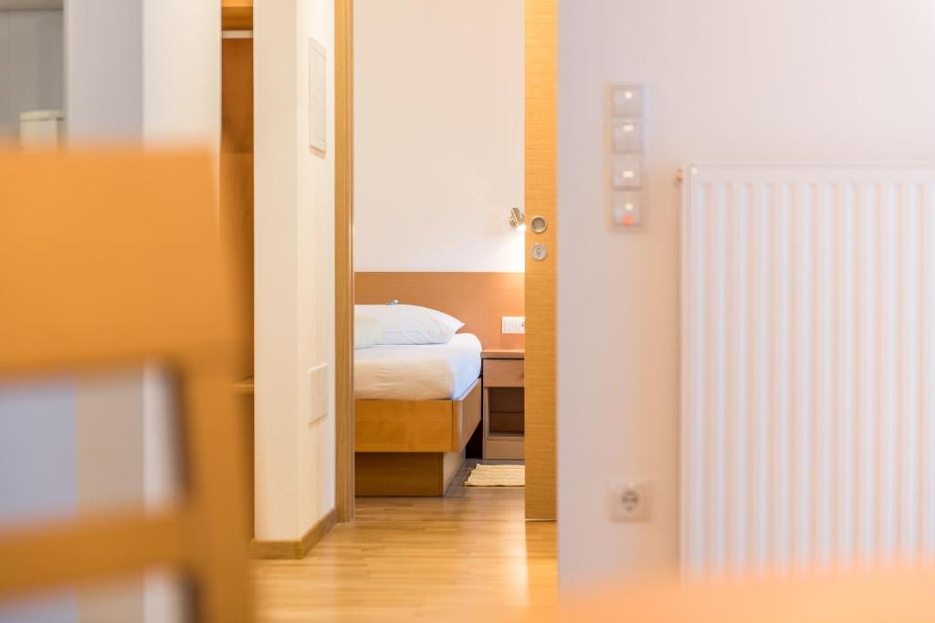 Postel nebo postele na pokoji v ubytování Haus Gufler