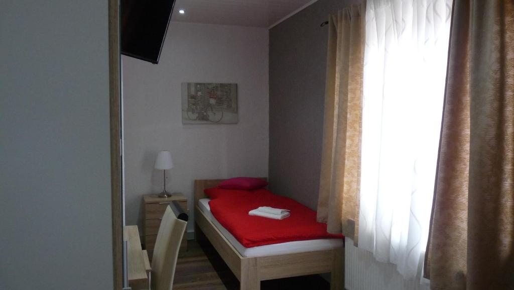 Postel nebo postele na pokoji v ubytování Hotel Rodizio UG